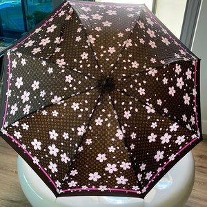 Preowned Louis Vuitton Monogram Parasol Umbrella ($900) ❤ liked